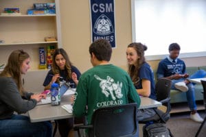 students studying at table