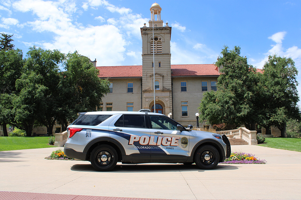 Colorado School of Mines police vehicle in front of Guggenheim Hall